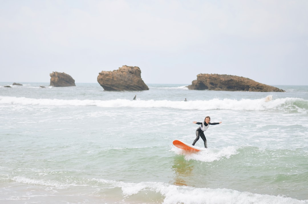 Surfer riding wave